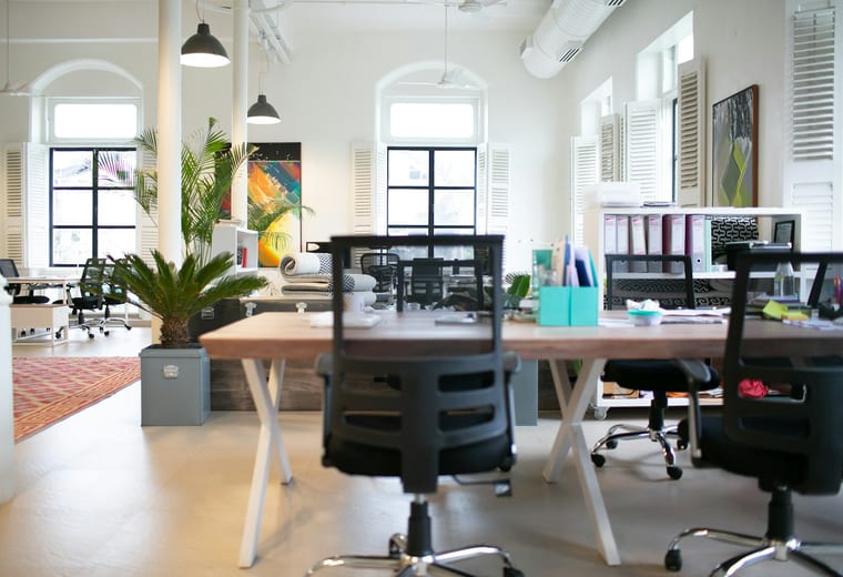 Modern open-plan office with empty desks